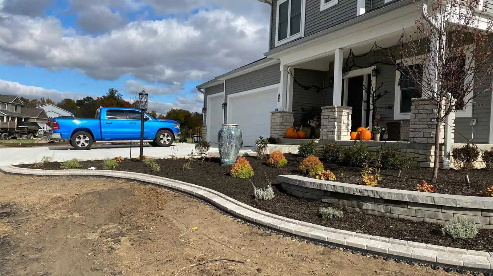 Beautifully landscaped garden installation with a variety of plants and design elements.