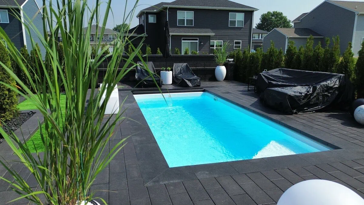 Elegant in-ground pool designed for relaxation and enjoyment in your backyard.