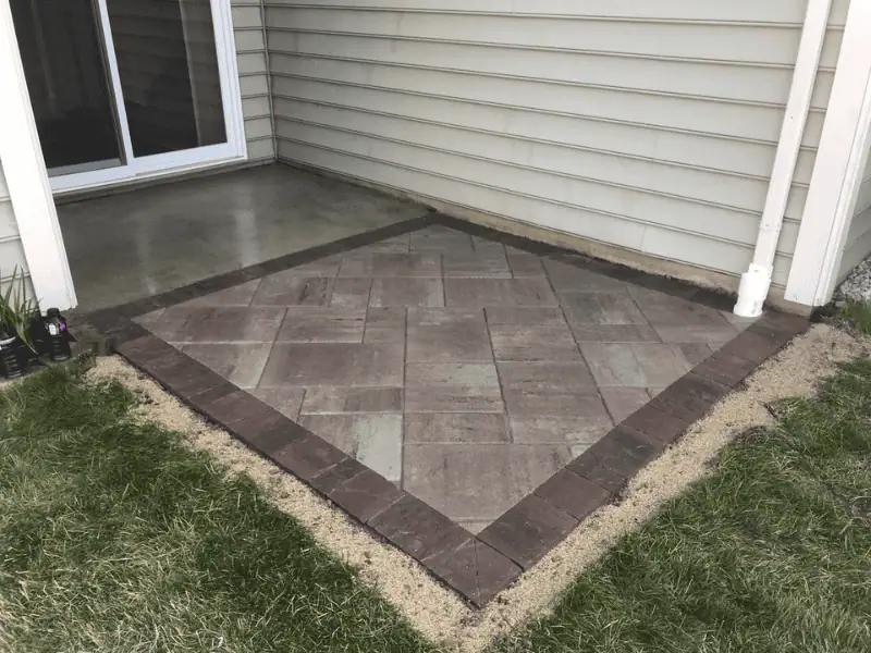 Professional hardscape installation project in Northwest Indiana with clean finishing work